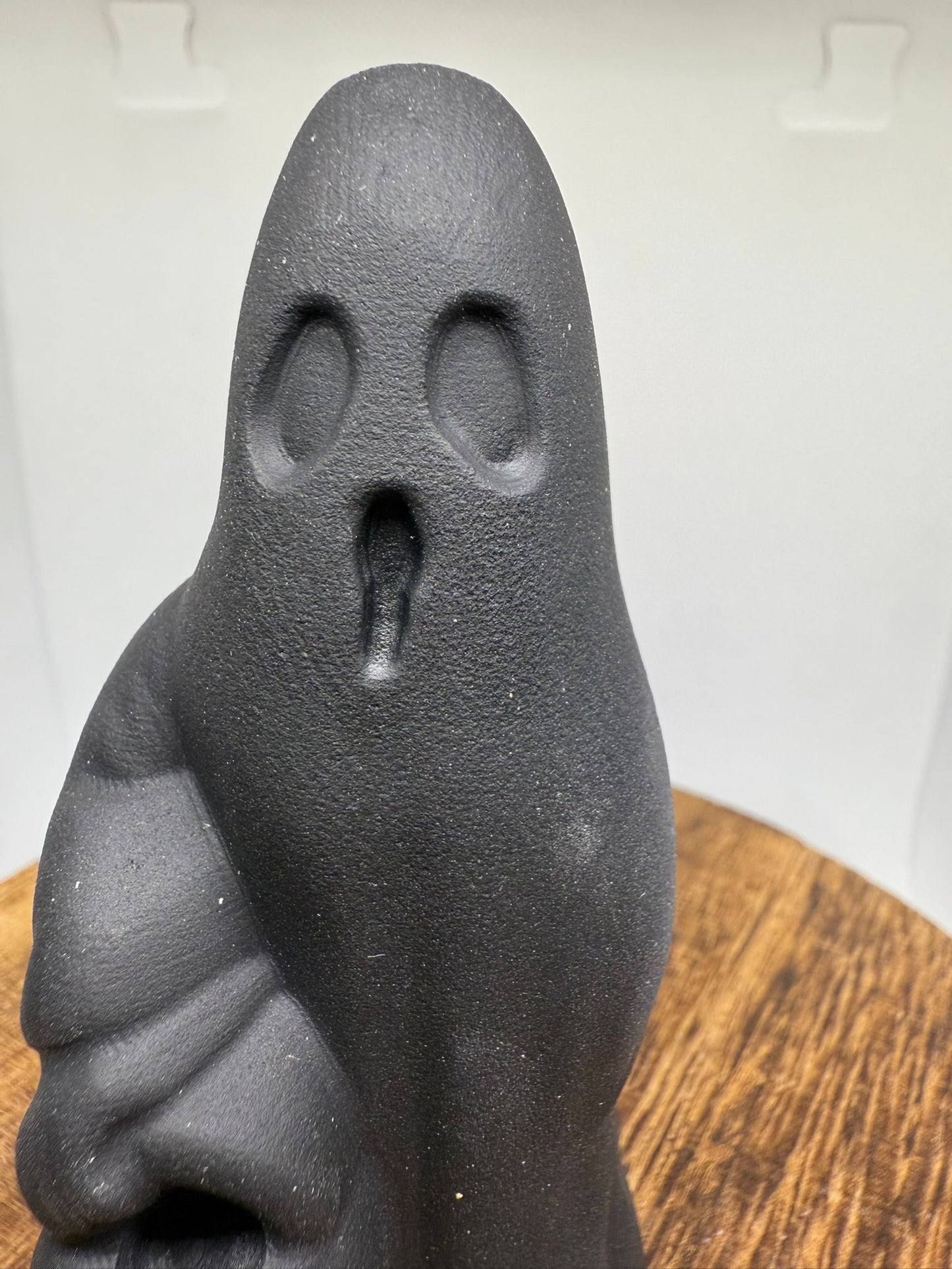 Black obsidian ghost with pumpkin