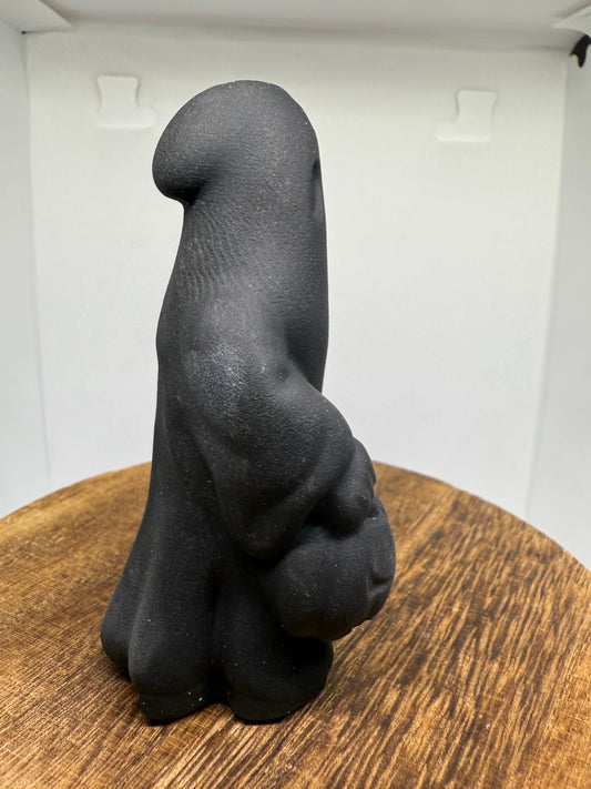 Black obsidian ghost with pumpkin